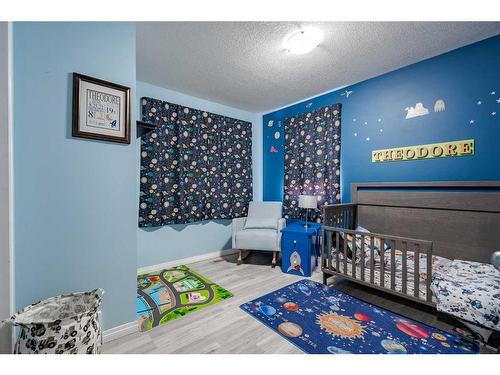 970 Reunion Gateway Nw, Airdrie, AB - Indoor Photo Showing Bedroom