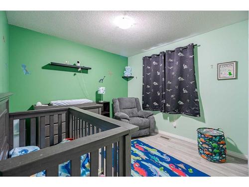 970 Reunion Gateway Nw, Airdrie, AB - Indoor Photo Showing Bedroom