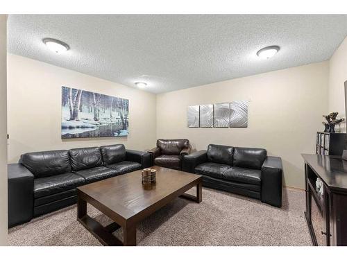 12 Cimarron Meadows Way, Okotoks, AB - Indoor Photo Showing Living Room