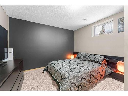 12 Cimarron Meadows Way, Okotoks, AB - Indoor Photo Showing Bedroom