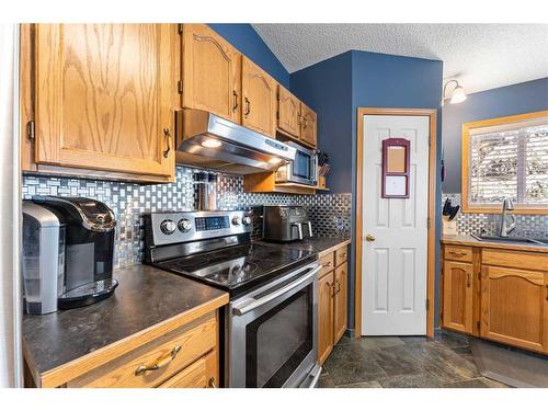 12 Cimarron Meadows Way, Okotoks, AB - Indoor Photo Showing Kitchen