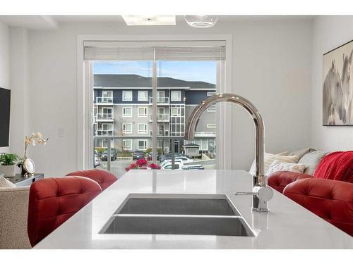 2221-76 Cornerstone Passage Ne, Calgary, AB - Indoor Photo Showing Kitchen With Double Sink