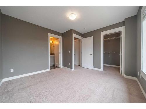 27-111 Rainbow Falls Gate, Chestermere, AB - Indoor Photo Showing Other Room