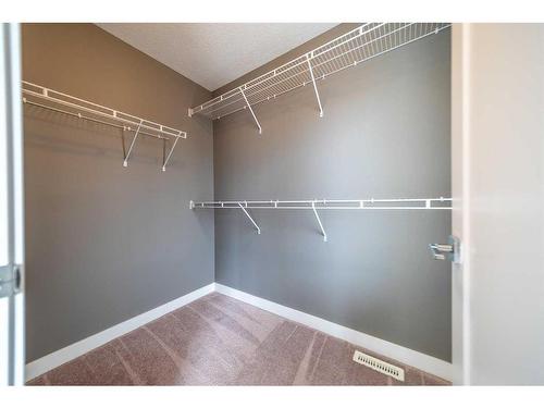 27-111 Rainbow Falls Gate, Chestermere, AB - Indoor With Storage