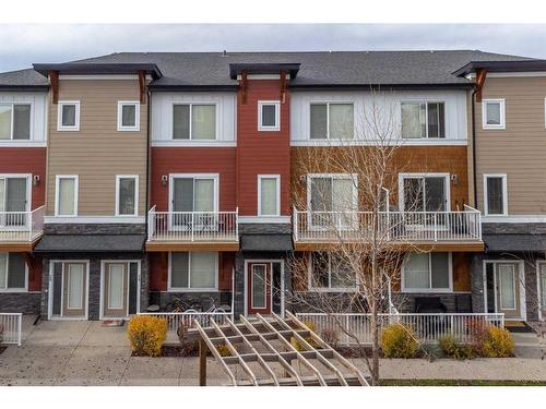 27-111 Rainbow Falls Gate, Chestermere, AB - Outdoor With Facade