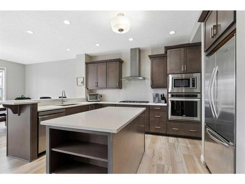 26 Marquis Heights Se, Calgary, AB - Indoor Photo Showing Kitchen With Stainless Steel Kitchen With Upgraded Kitchen