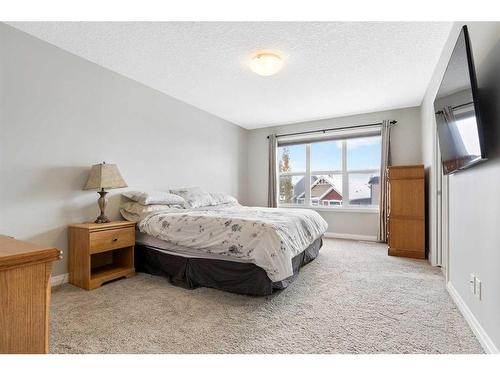 26 Marquis Heights Se, Calgary, AB - Indoor Photo Showing Bedroom