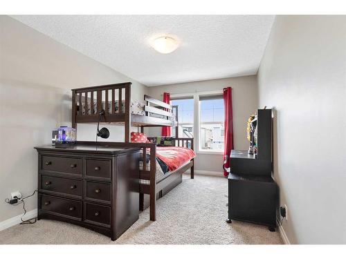 26 Marquis Heights Se, Calgary, AB - Indoor Photo Showing Bedroom