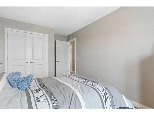 26 Marquis Heights Se, Calgary, AB - Indoor Photo Showing Bedroom