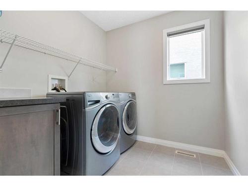 26 Marquis Heights Se, Calgary, AB - Indoor Photo Showing Laundry Room