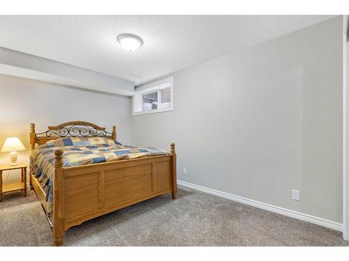 26 Marquis Heights Se, Calgary, AB - Indoor Photo Showing Bedroom