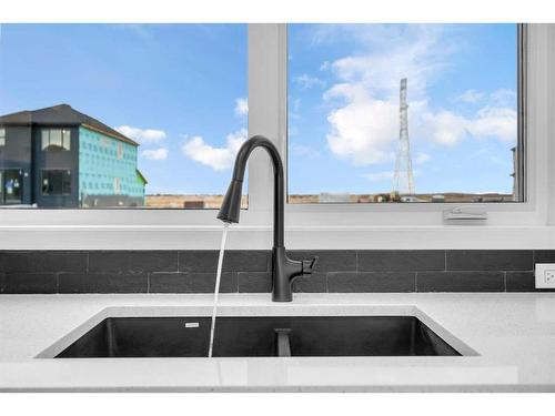 364 Hotchkiss Drive Se, Calgary, AB - Indoor Photo Showing Kitchen With Double Sink