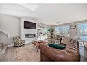 66 Howse Common Ne, Calgary, AB  - Indoor Photo Showing Living Room With Fireplace 