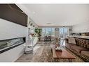 66 Howse Common Ne, Calgary, AB  - Indoor Photo Showing Living Room With Fireplace 