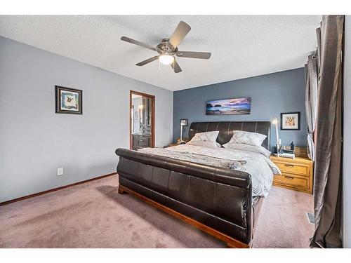 6 Mount Gibraltar Place Se, Calgary, AB - Indoor Photo Showing Bedroom