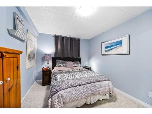 6 Mount Gibraltar Place Se, Calgary, AB - Indoor Photo Showing Bedroom