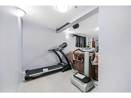 6 Mount Gibraltar Place Se, Calgary, AB - Indoor Photo Showing Gym Room