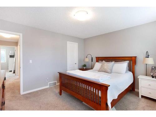 2060 New Brighton Grove Se, Calgary, AB - Indoor Photo Showing Bedroom