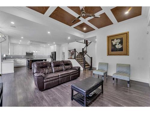 205 Kinniburgh Cove, Chestermere, AB - Indoor Photo Showing Living Room