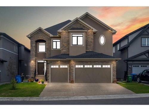 205 Kinniburgh Cove, Chestermere, AB - Outdoor With Facade