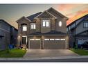 205 Kinniburgh Cove, Chestermere, AB  - Outdoor With Facade 