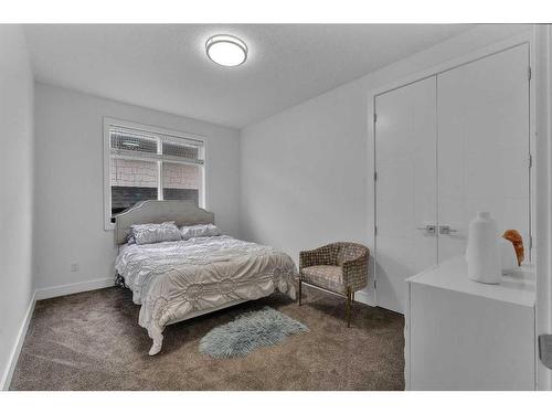 205 Kinniburgh Cove, Chestermere, AB - Indoor Photo Showing Bedroom