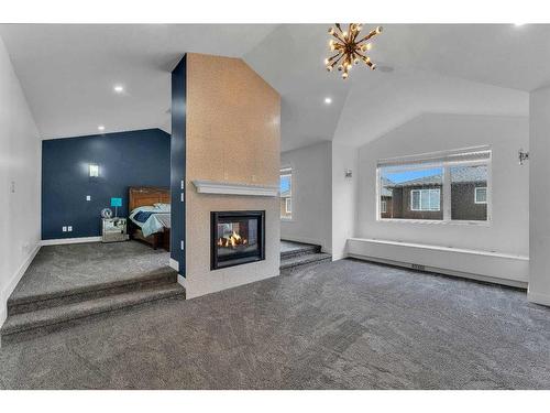 205 Kinniburgh Cove, Chestermere, AB - Indoor With Fireplace