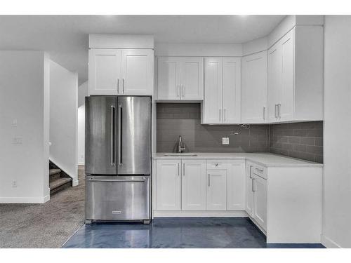 205 Kinniburgh Cove, Chestermere, AB - Indoor Photo Showing Kitchen