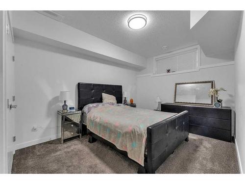 205 Kinniburgh Cove, Chestermere, AB - Indoor Photo Showing Bedroom