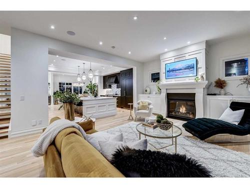 1920 31 Avenue Sw, Calgary, AB - Indoor Photo Showing Living Room With Fireplace