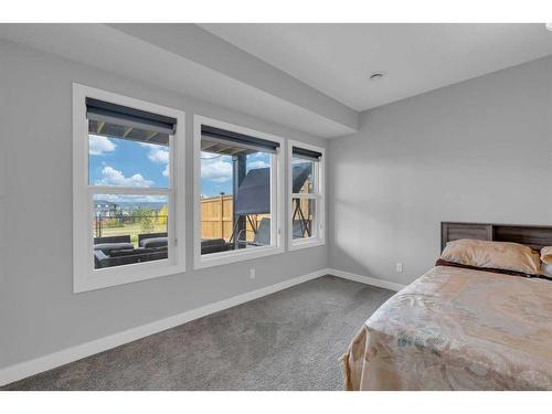 233 Crestmont Drive Sw, Calgary, AB - Indoor Photo Showing Bedroom