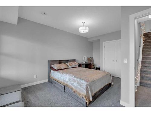 233 Crestmont Drive Sw, Calgary, AB - Indoor Photo Showing Bedroom