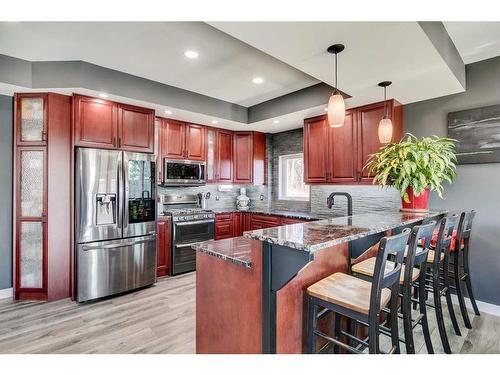 3-5242 Twp Road 290, Rural Mountain View County, AB - Indoor Photo Showing Kitchen With Stainless Steel Kitchen