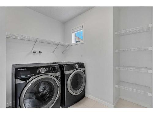 9 Marquis Link Se, Calgary, AB - Indoor Photo Showing Laundry Room