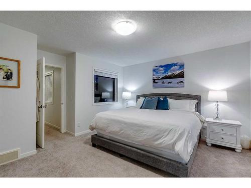 9 Marquis Link Se, Calgary, AB - Indoor Photo Showing Bedroom