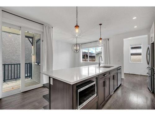 9 Marquis Link Se, Calgary, AB - Indoor Photo Showing Kitchen With Upgraded Kitchen