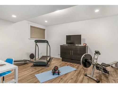 40 Masters Landing Se, Calgary, AB - Indoor Photo Showing Gym Room