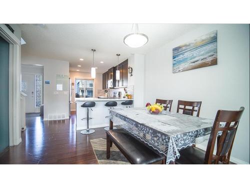 468 Copperpond Boulevard Se, Calgary, AB - Indoor Photo Showing Dining Room