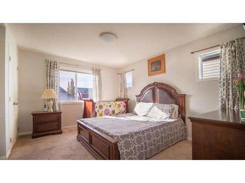 468 Copperpond Boulevard Se, Calgary, AB - Indoor Photo Showing Bedroom