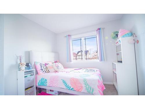 468 Copperpond Boulevard Se, Calgary, AB - Indoor Photo Showing Bedroom