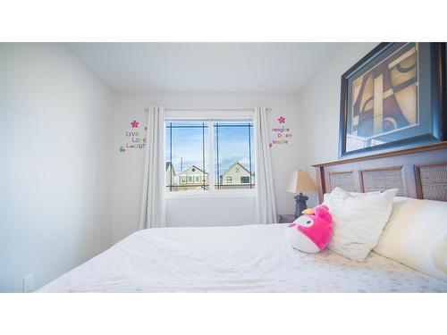 468 Copperpond Boulevard Se, Calgary, AB - Indoor Photo Showing Bedroom