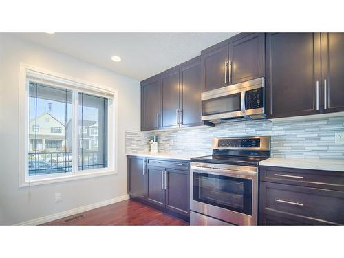 468 Copperpond Boulevard Se, Calgary, AB - Indoor Photo Showing Kitchen