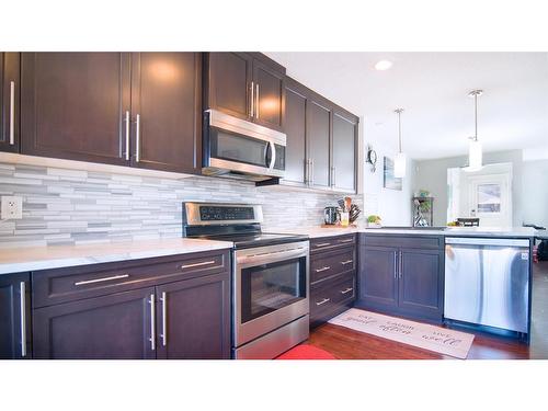 468 Copperpond Boulevard Se, Calgary, AB - Indoor Photo Showing Kitchen With Stainless Steel Kitchen With Upgraded Kitchen