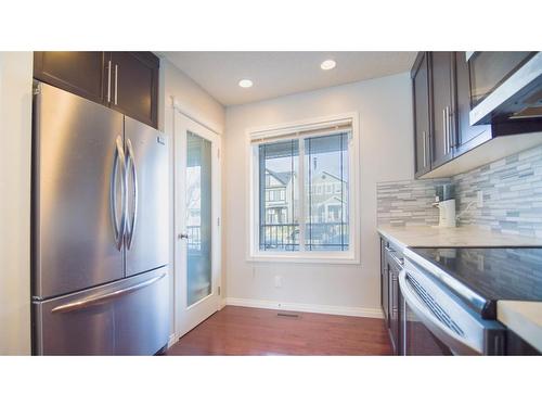 468 Copperpond Boulevard Se, Calgary, AB - Indoor Photo Showing Kitchen