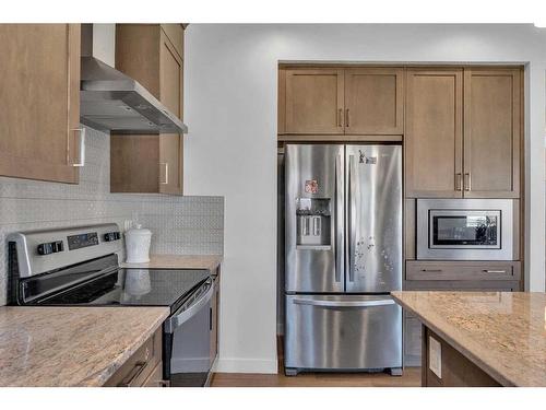 57 Saddlestone Green Ne, Calgary, AB - Indoor Photo Showing Kitchen