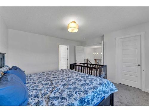 57 Saddlestone Green Ne, Calgary, AB - Indoor Photo Showing Bedroom