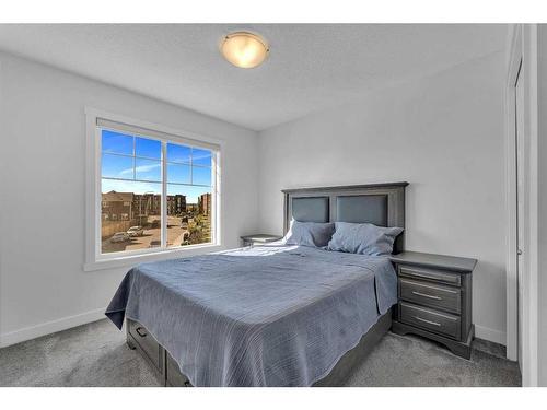 57 Saddlestone Green Ne, Calgary, AB - Indoor Photo Showing Bedroom