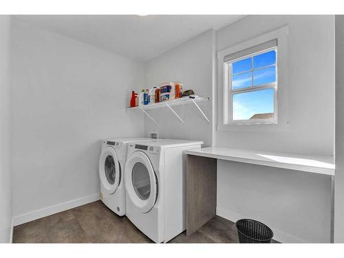 57 Saddlestone Green Ne, Calgary, AB - Indoor Photo Showing Laundry Room