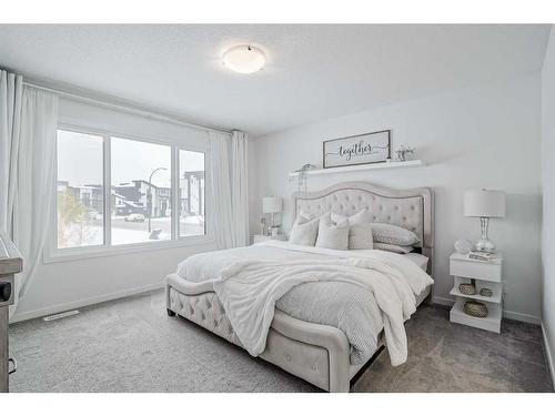 142 Seton Gardens Se, Calgary, AB - Indoor Photo Showing Bedroom