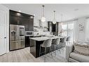 142 Seton Gardens Se, Calgary, AB  - Indoor Photo Showing Kitchen With Stainless Steel Kitchen With Upgraded Kitchen 